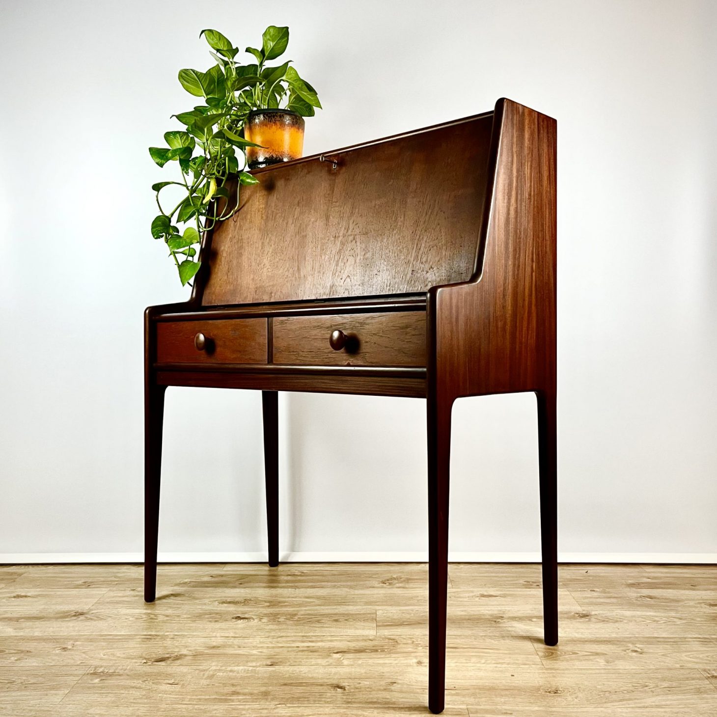 A rare and elegant John Herbert designed writing bureau, by A. Younger Ltd