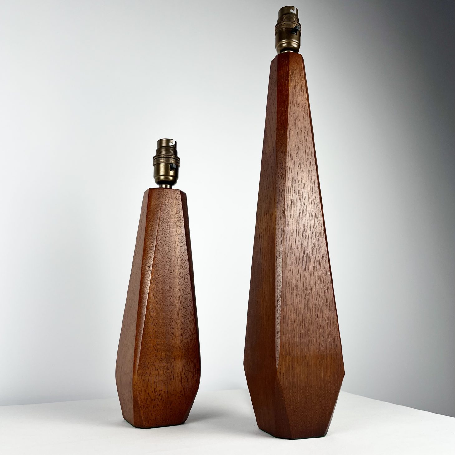 Sculptural Pair of 1960s Faceted Obelisk Teak Lamp Bases