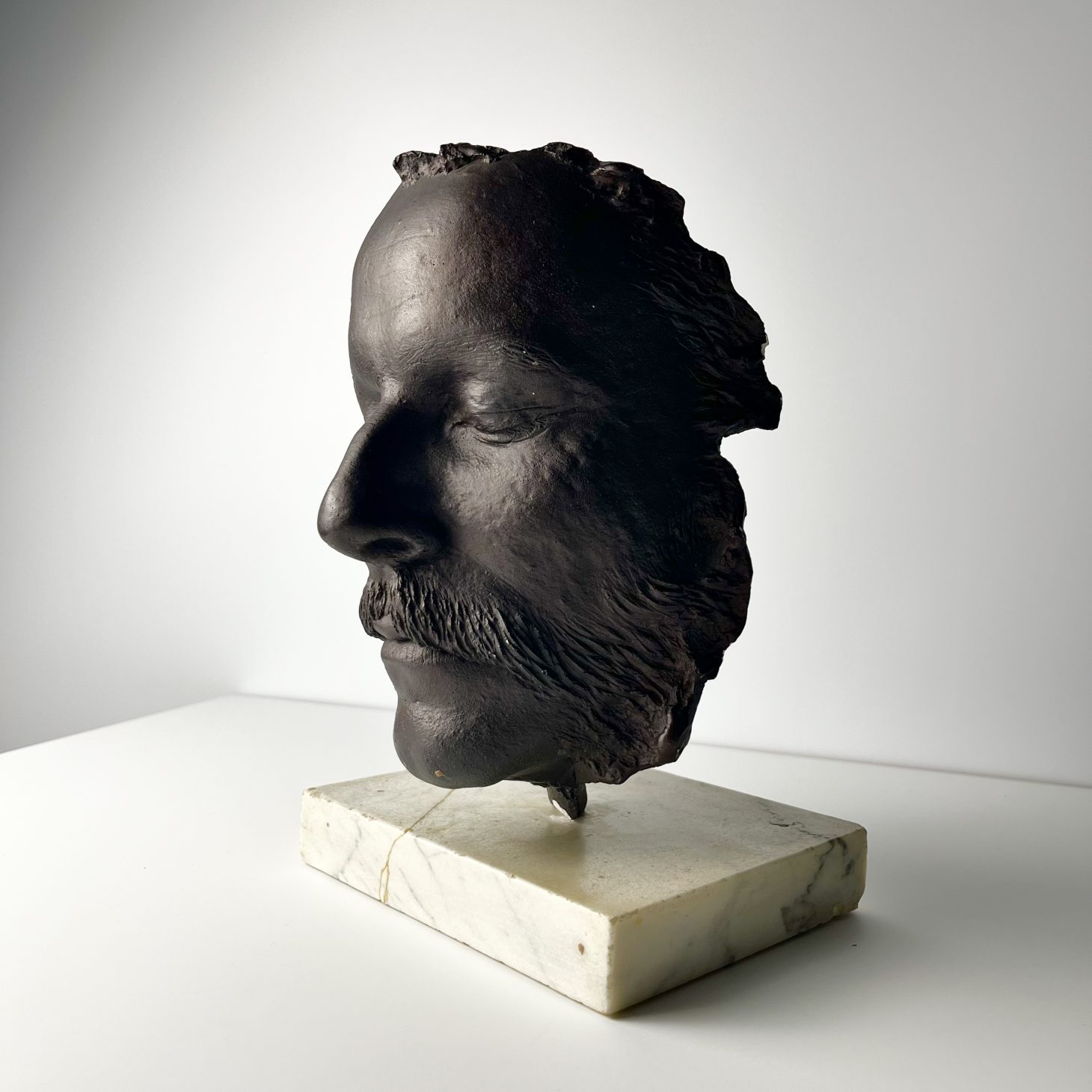 Enigmatic Death Mask Sculpture on Marble Base, Age and Origin Unknown