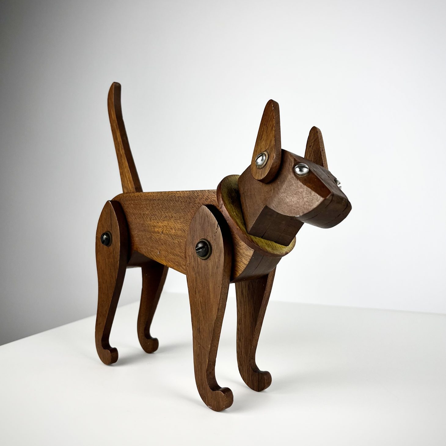 Charming Articulated Mahogany Dog, British 1950s